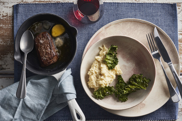 Teaser image for Venison leg steak with parsley and garlic butter, celeriac and kale crisps