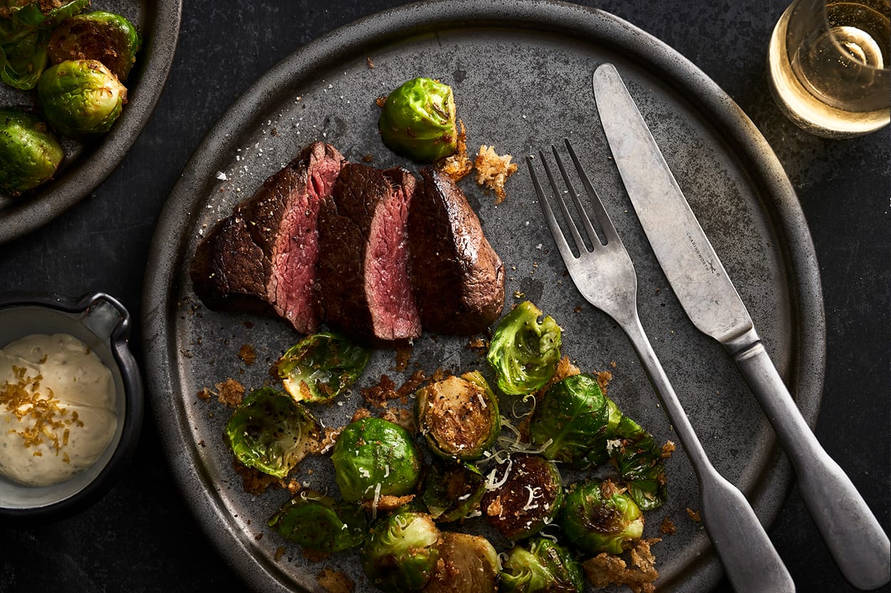 Beef eye fillet with Seasonal Greens & Lemon Garlic Cream